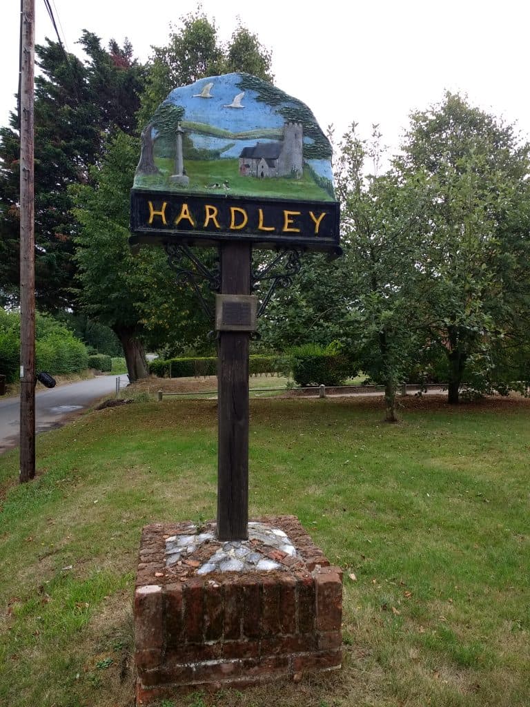 Village sign entering Hardley